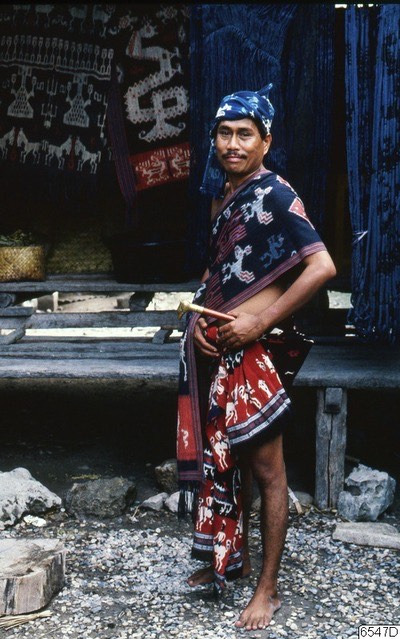 Man wearing ikat shoulder and hip cloths
